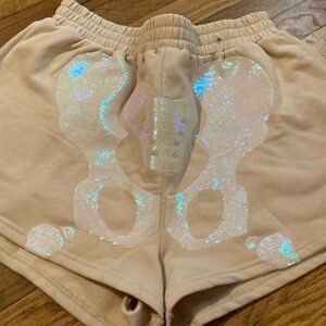 Worn once. Skeleton sequins shorts